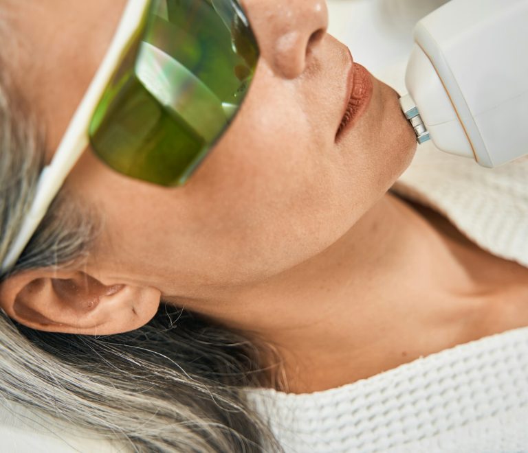 Female patient doing professional face care procedure